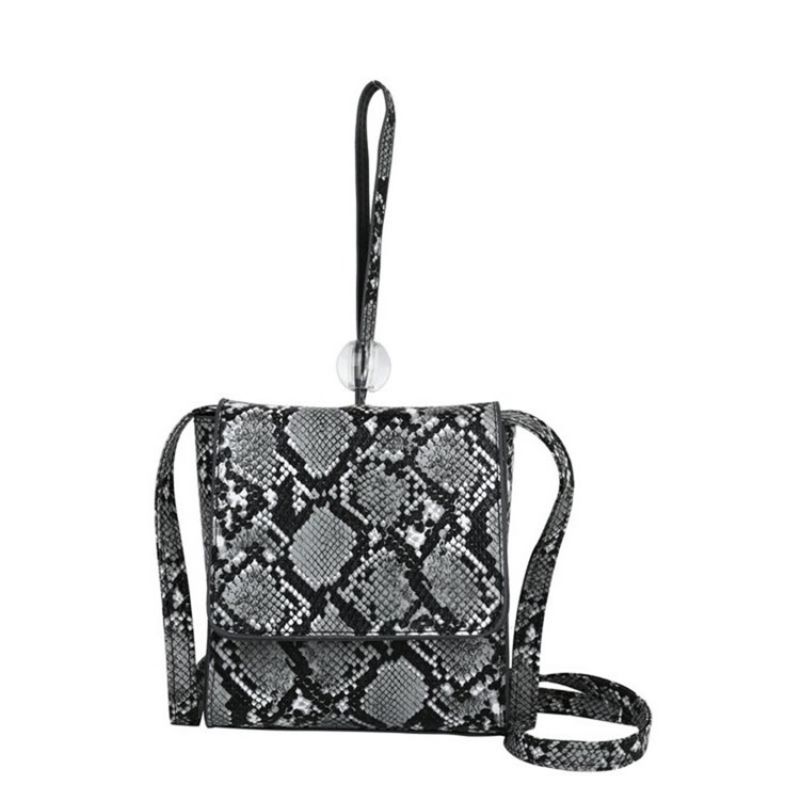 Serpentine Prægning Rektangel Crossbody Tasker